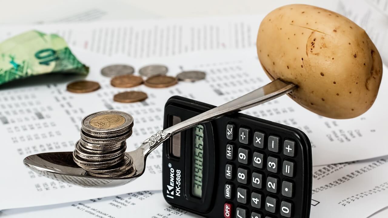 Coins and Potato on Spoon